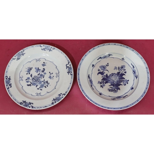 114 - 2 18th Century Chinese blue and white plates with allover floral, leaf and scroll decoration, 23.5cm... 