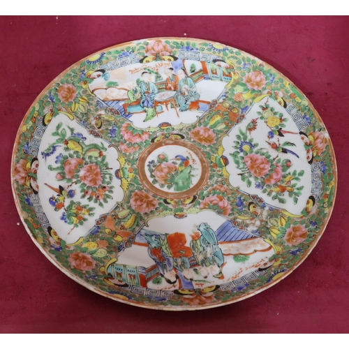 120 - A Cantonese round plate on white ground with multicoloured figure, bird, floral, leaf and gilt decor... 