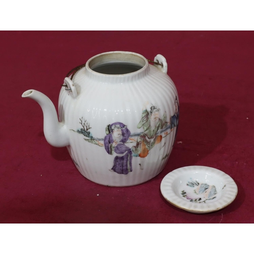 132 - An Oriental round bulbous reeded teapot on white ground with multicoloured Oriental figure and fence... 