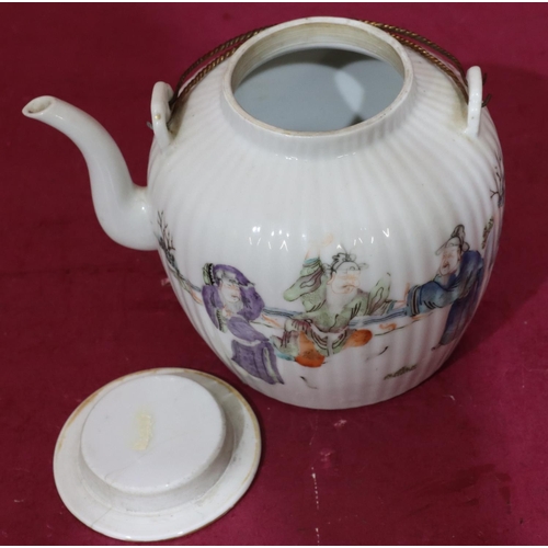 132 - An Oriental round bulbous reeded teapot on white ground with multicoloured Oriental figure and fence... 