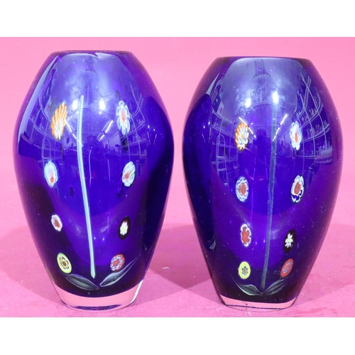 133 - A pair of of millefiori style bulbous shaped vases on blue ground with coloured decoration, 20cm hig... 