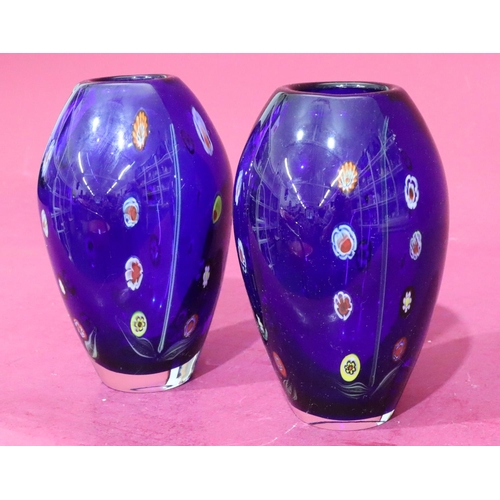 133 - A pair of of millefiori style bulbous shaped vases on blue ground with coloured decoration, 20cm hig... 