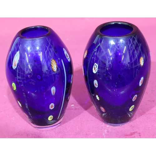 133 - A pair of of millefiori style bulbous shaped vases on blue ground with coloured decoration, 20cm hig... 