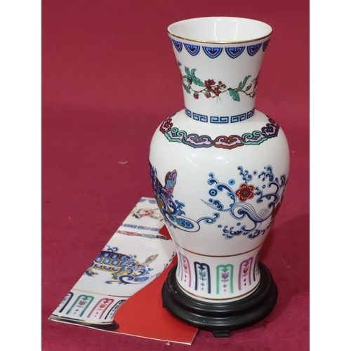 135 - A modern bone china round bulbous thin neck trumpet shaped vase 