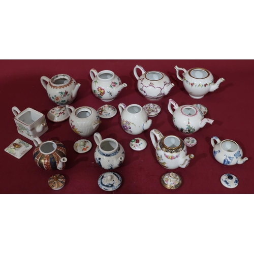 136 - 12 modern reproduction teapots after Royal Worcester 