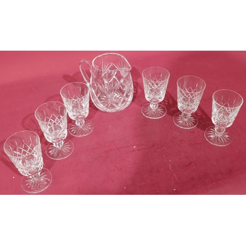 137 - A Brierglass lead crystal round bulbous shaped water jug (boxed), with 6 matching glasses (boxed)