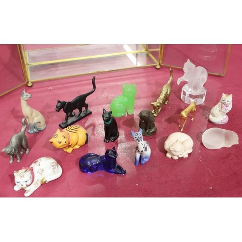 140 - A Goebel 1987 glass figure of a cat, 15 glass china and metal figures of cats, largest 10cm high, wi... 