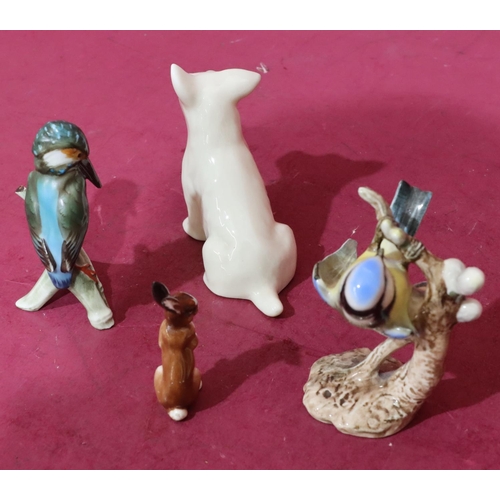 143 - A miniature Royal Doulton figure of a rabbit K39, 6cm high, a Beswick figure of a seated dog, 9cm hi... 