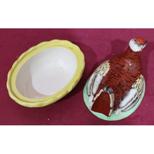 145 - A China egg crock in the form of a bird with cover, 16.5cm high