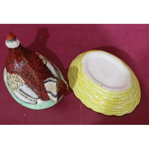 145 - A China egg crock in the form of a bird with cover, 16.5cm high