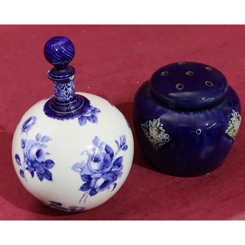 153 - A Royal Doulton glazed earthenware round bulbous shaped potpourri with pierced cover on blue ground ... 