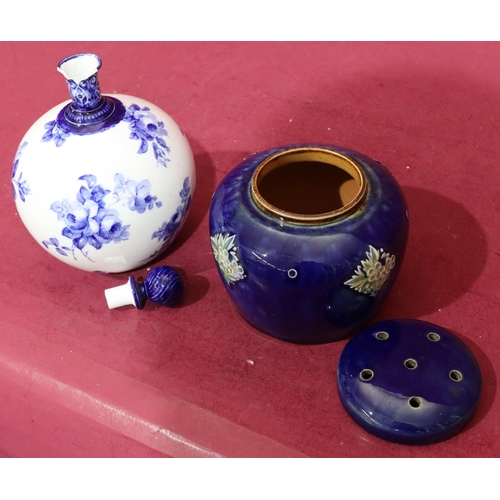 153 - A Royal Doulton glazed earthenware round bulbous shaped potpourri with pierced cover on blue ground ... 