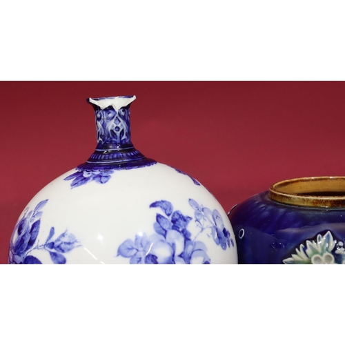 153 - A Royal Doulton glazed earthenware round bulbous shaped potpourri with pierced cover on blue ground ... 