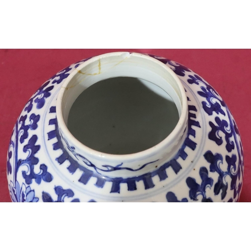 156 - A 19th Century Chinese round bulbous thin neck lidded pot on blue and white ground with allover flor... 