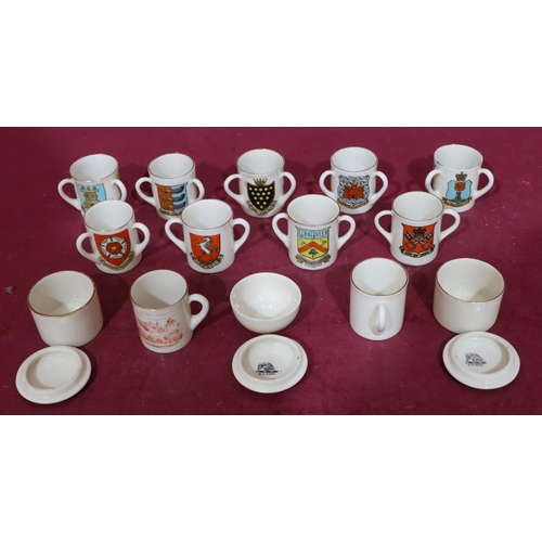 164 - 10 W.H Goss miniature loving cups with various crests, a similar miniature mug and 3 small lidded W.... 