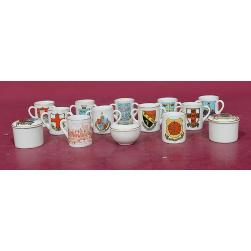 164 - 10 W.H Goss miniature loving cups with various crests, a similar miniature mug and 3 small lidded W.... 