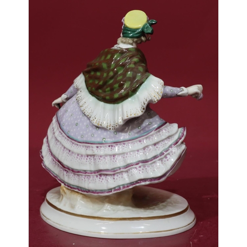 183 - A Continental china figure of a seated lady in lilac dress on oval base, 26cm high