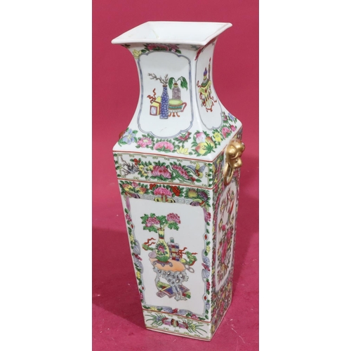 201 - A reproduction Cantonese square thin neck trumpet shaped vase on white ground with multicoloured flo... 