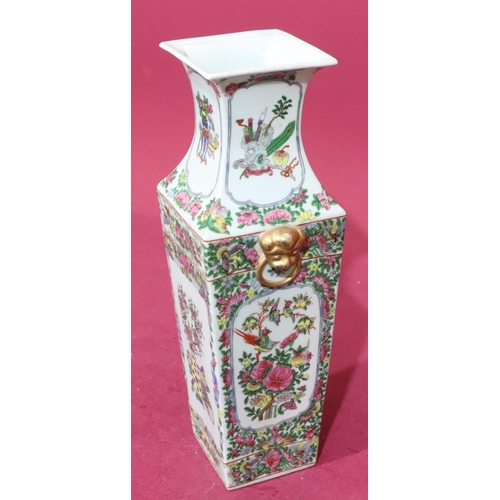 201 - A reproduction Cantonese square thin neck trumpet shaped vase on white ground with multicoloured flo... 