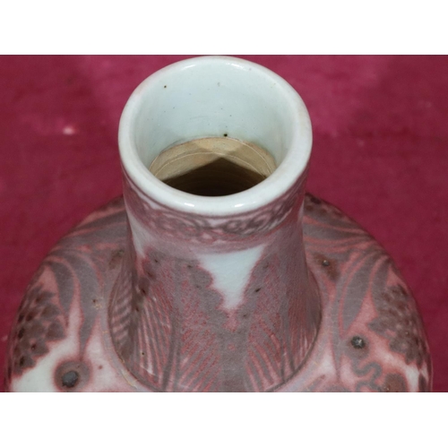 210 - An Oriental glazed earthenware round bulbous thin neck vase on white and red ground with bird, flora... 