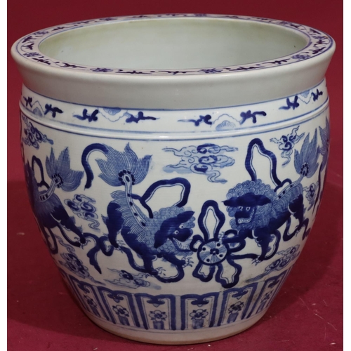 211 - A Chinese blue and white round bulbous shaped jardinière with allover dog of Pho, cloud and scroll d... 