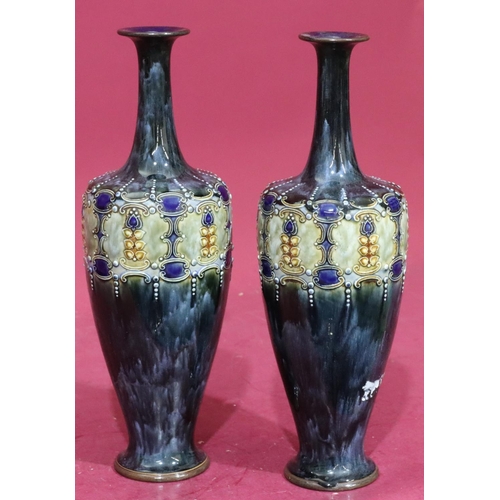 212 - A pair of Royal Doulton glazed earthenware round bulbous thin neck trumpet shaped vases on blue and ... 