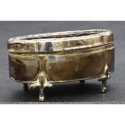 294 - A Birmingham oval scallop shaped silver trinket box with tortoiseshell hinged lid inset with swag an... 