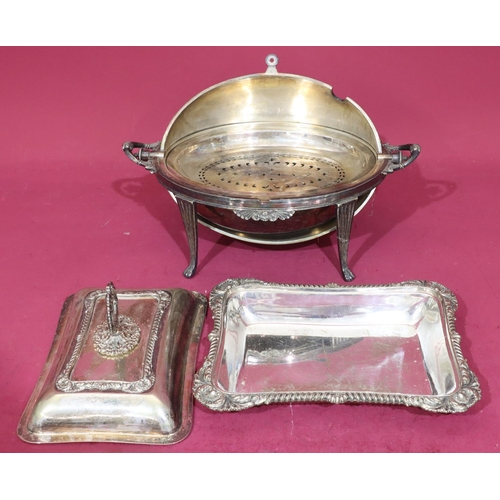 295 - A silver plated oval 2-handled breakfast dish with swivel top enclosing liner on splayed claw feet, ... 