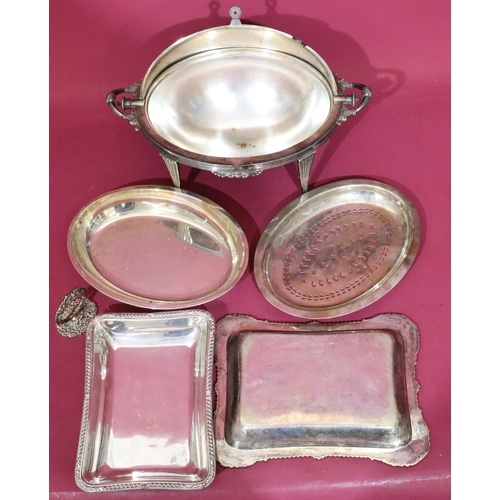 295 - A silver plated oval 2-handled breakfast dish with swivel top enclosing liner on splayed claw feet, ... 