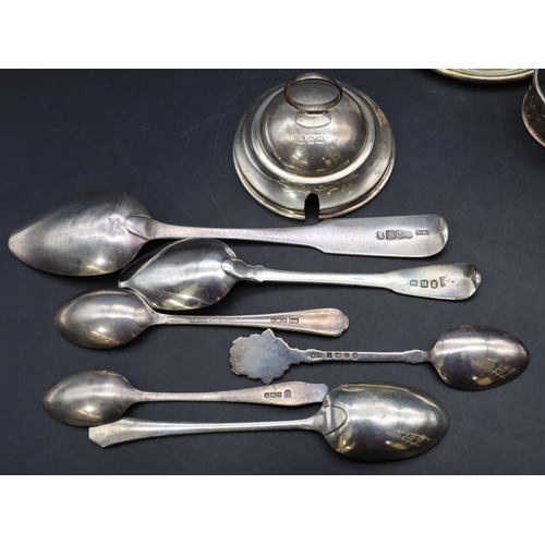 296 - A Scottish silver teaspoon, 5 other silver teaspoons, 2 silver napkin rings, a silver top and an 800... 