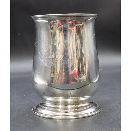 301 - An early George III silver round bulbous shaped tankard with scroll handle on sweeping foot, engrave... 