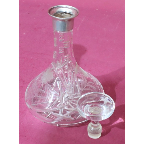 302 - A cut glass round bulbous thin neck ship decanter with stopper and London silver neck (inner part to... 