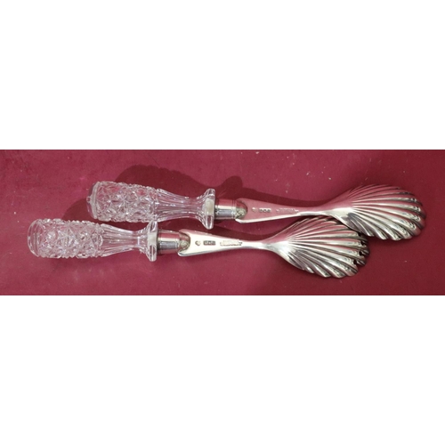 307 - A pair of London silver and cut glass salad servers with shell shaped bowls, maker Goldsmiths & Silv... 