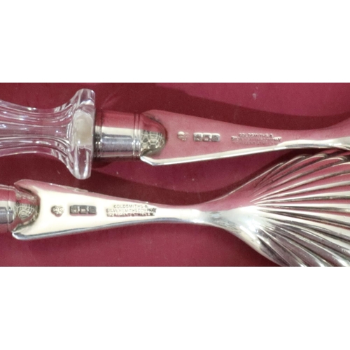 307 - A pair of London silver and cut glass salad servers with shell shaped bowls, maker Goldsmiths & Silv... 