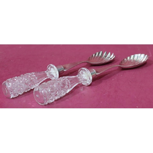 307 - A pair of London silver and cut glass salad servers with shell shaped bowls, maker Goldsmiths & Silv... 