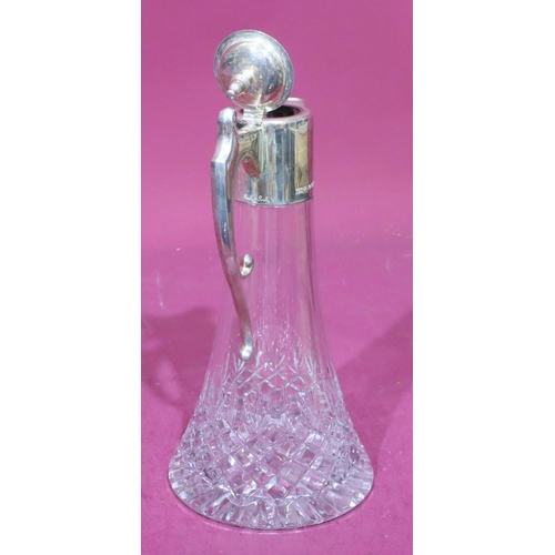 308 - A heavy cut glass claret jug with 925 plain silver neck, hinged lid and scroll handle, 30cm high