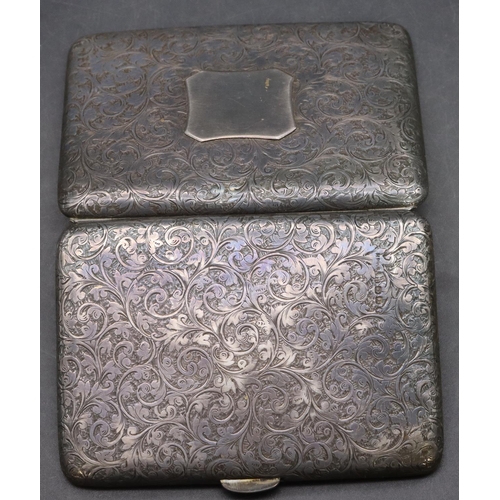 314 - A Victorian Birmingham silver cigarette case with allover embossed scroll decoration, hinged front, ... 