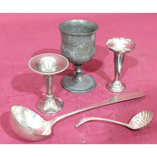 316 - A Donador soup ladle, 2 silver plated spill vases, a silver plated sifter spoon with shell shaped bo... 