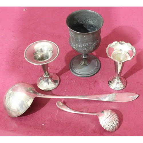 316 - A Donador soup ladle, 2 silver plated spill vases, a silver plated sifter spoon with shell shaped bo... 