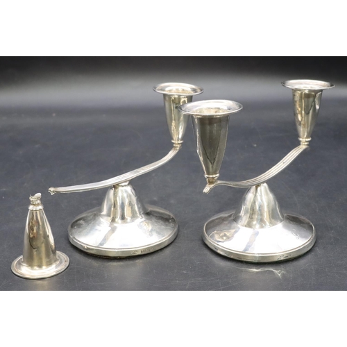 319 - A pair of Birmingham silver double candlesticks on round sweeping base (1 candleholder a/f), 11cm hi... 