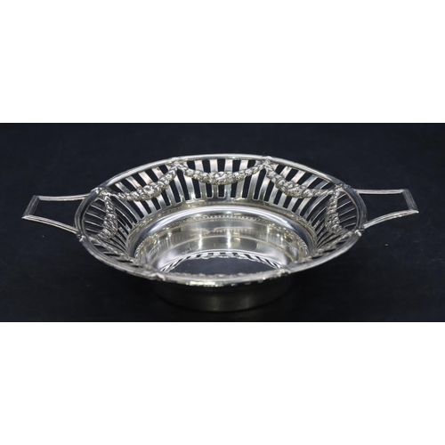 330 - A London silver round 2-handled sweetmeat dish with pierced gallery and raised swag decoration, 16.3... 