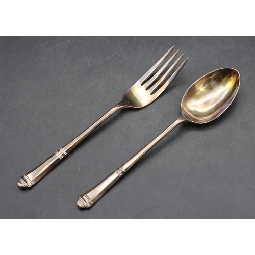 336 - A child's Sheffield silver fork and spoon, maker's mark FH, in red leather case, 1.2oz