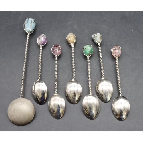 339 - A set of 6 Continental teaspoons mounted with coloured stones and a similar larger spoon