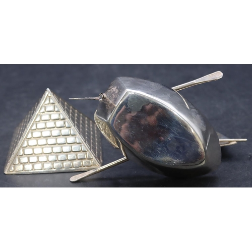 356 - A silver coloured metal paperweight in the form of a pyramid, 4cm high and a Continental silver colo... 