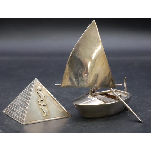 356 - A silver coloured metal paperweight in the form of a pyramid, 4cm high and a Continental silver colo... 