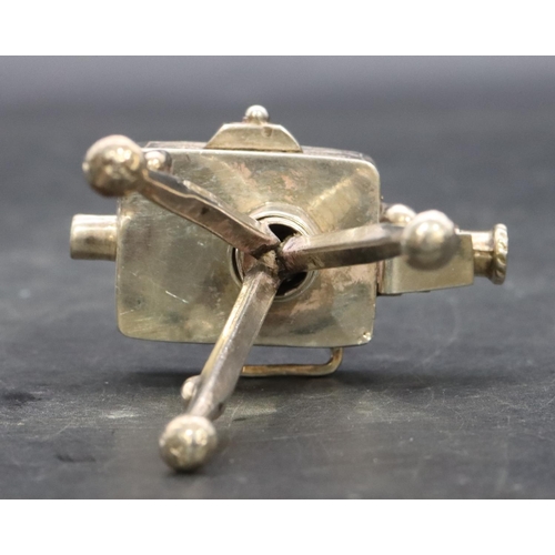 357 - A silver coloured metal miniature model of a box camera on a tripod, 7.5cm high, 1.5oz