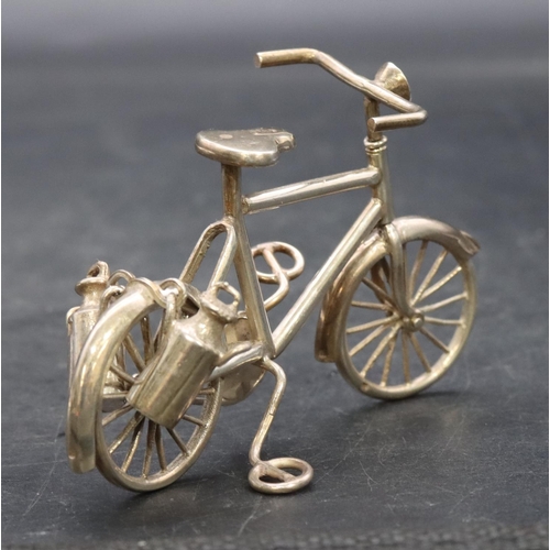 359 - A Continental miniature silver coloured metal model of a bicycle, 6cm high, 1.5oz