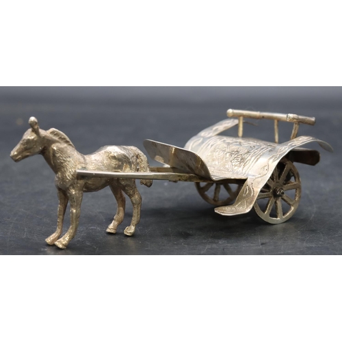 360 - A Continental silver coloured metal horse drawn cart with whip, 13cm long, 3.5oz