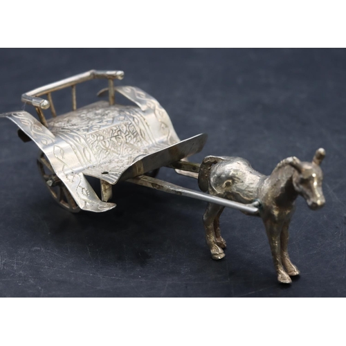 360 - A Continental silver coloured metal horse drawn cart with whip, 13cm long, 3.5oz