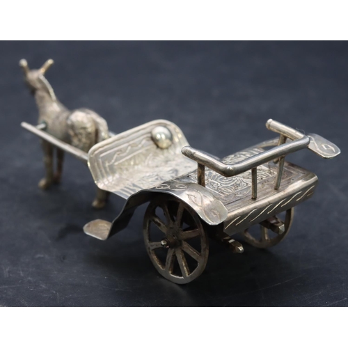 360 - A Continental silver coloured metal horse drawn cart with whip, 13cm long, 3.5oz